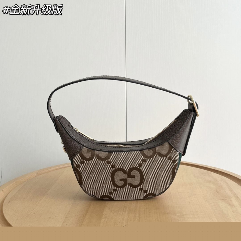 G*u*i top handle bags